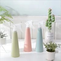 

Nordic candy color plastic Tall bottle flower sprayer Hand pressure Watering pot water cans