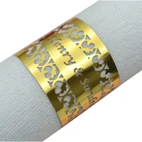 

Filigree laser cut personalized gold napkin rings for weddings