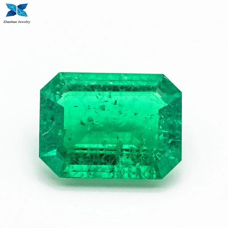 

lab created rough emerald green gemstone with natural inclusion for emerald cut rings