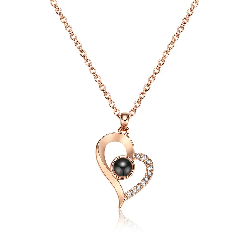 

2019 New Arrival Rose Gold Plated LOVE YOU in 100 languages Pendant Necklace Crystal HeartI Light Projection Pendant Necklace, Picture