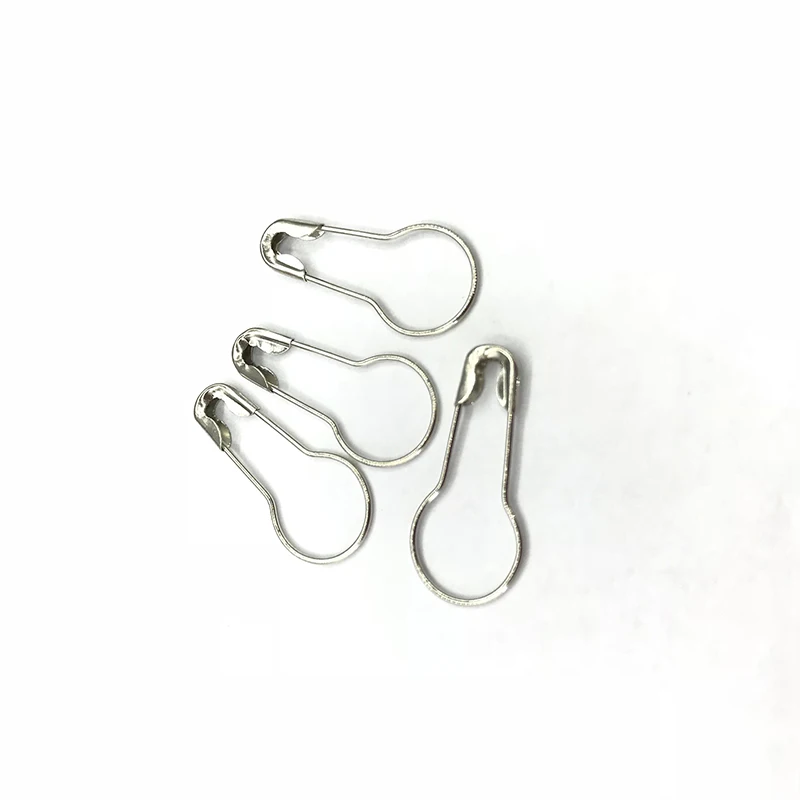 small white safety pins