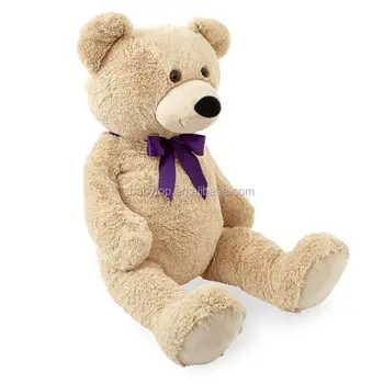 teddy bear with purple bow tie