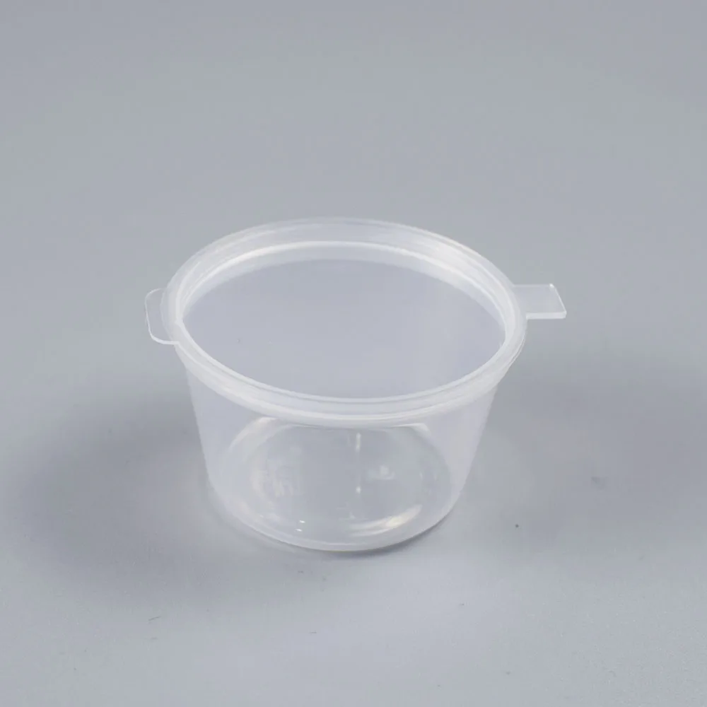 

1 oz disposable clear plastic conjoined soy sauce cup with lid