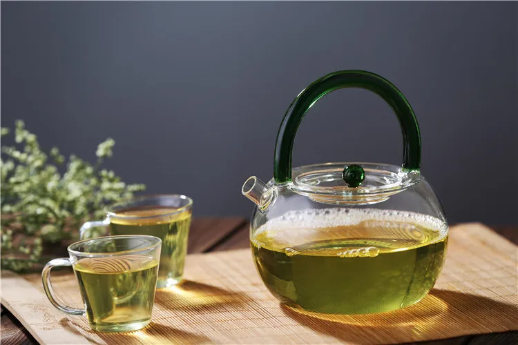 Hot selling 600ml small pyrex glass teapot with strainer flower pot tea pot with infuser