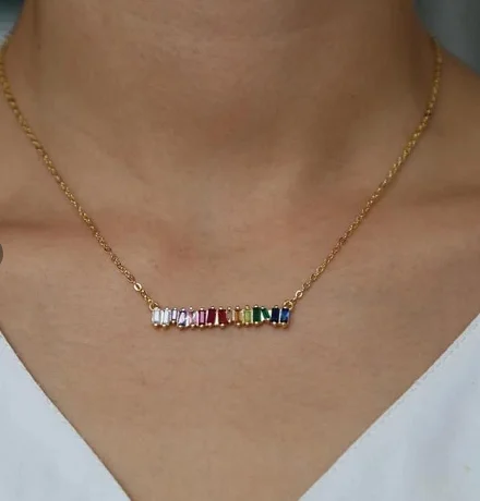 

Stainless steel standing zirconia rainbow set jewelry worn by Mexican bride at the wedding