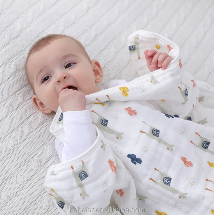 baby holding towel