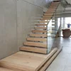 Wood open step with glass railing home use straight stair