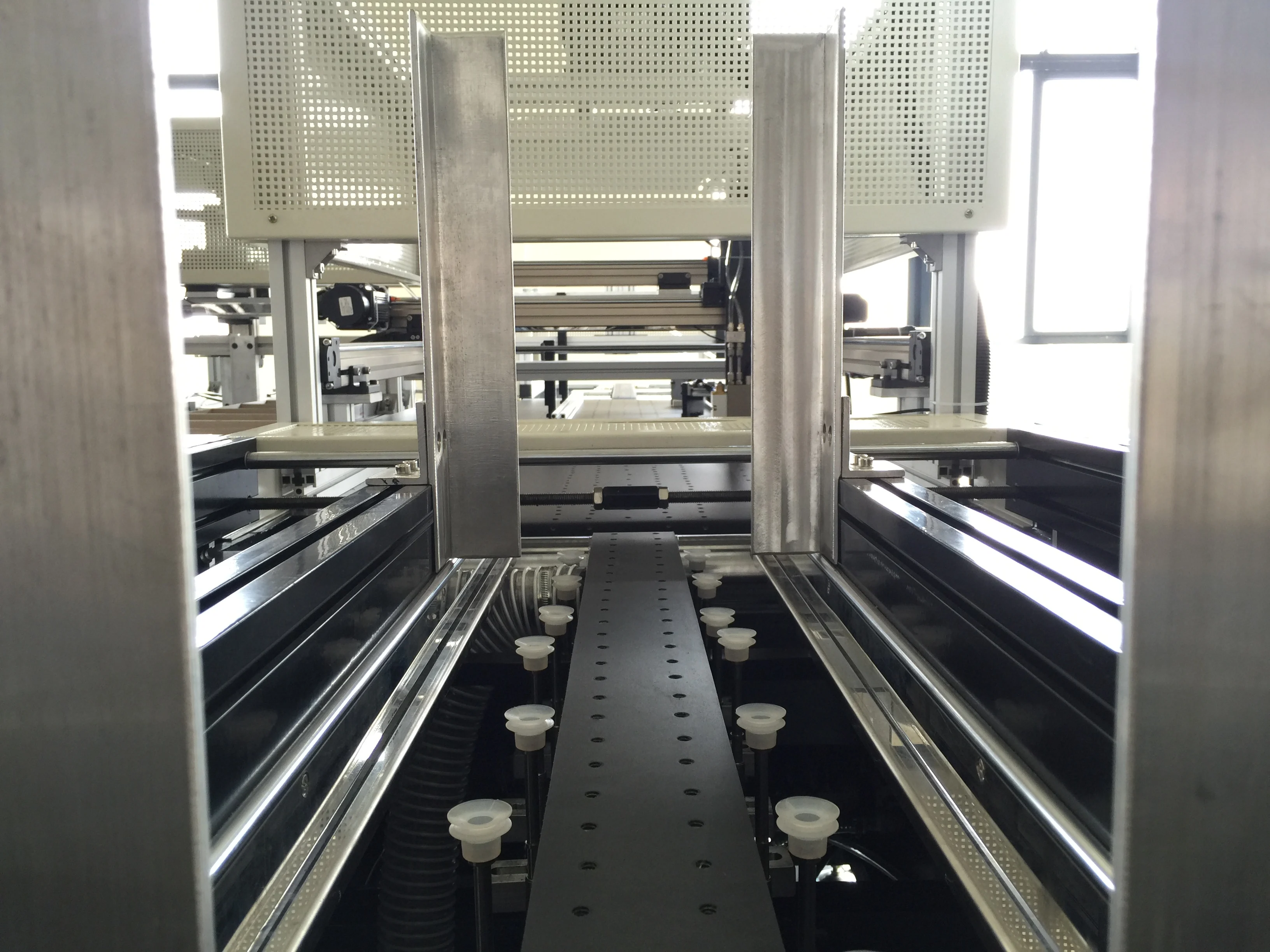 suction equipment--hardcover will keep still on the conveyor