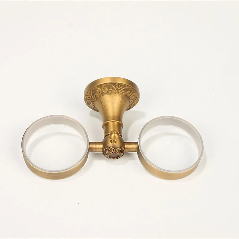 
double antique brass wall mounted cup holder for holding bathroom tool 