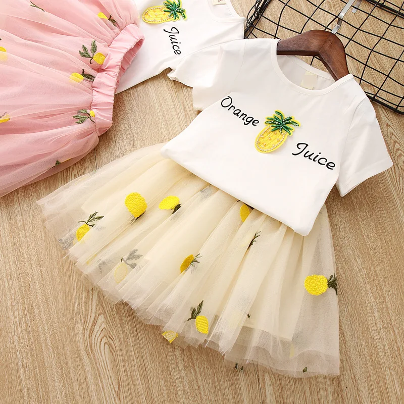 

Short Sleeve Floral Shirts Girl Pineapple T-shirt Pineapple embroidered skirts 2pcs Sets Bulk Wholesale For Kids Clothing, Picture show