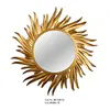 Iron painting gold sun burst mirror