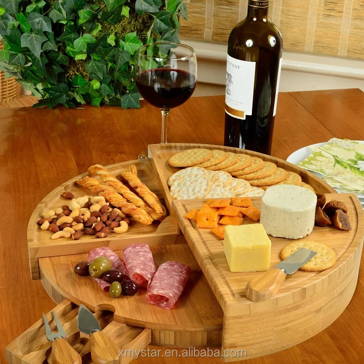 
Natural round bamboo cheese board with 3 cheese knives in slide-out drawer 