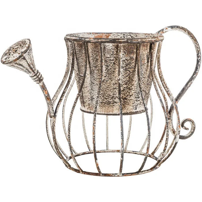rustic metal watering can planter