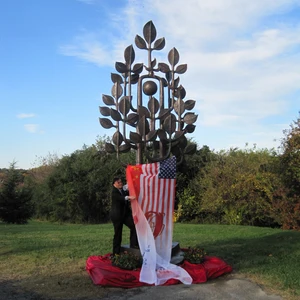 bronze peace tree sculpture
