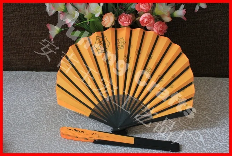 
Chinese folding hand fan with black bamboo ribs 