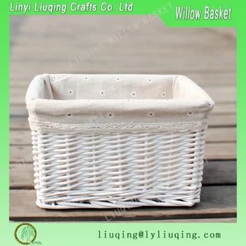 small white wicker storage baskets
