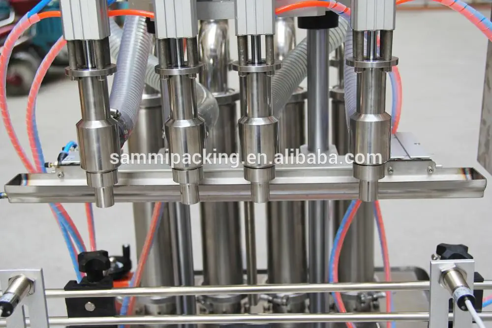 Automatic 4 Heads Liquid Filling Machine - Efficient & Affordable