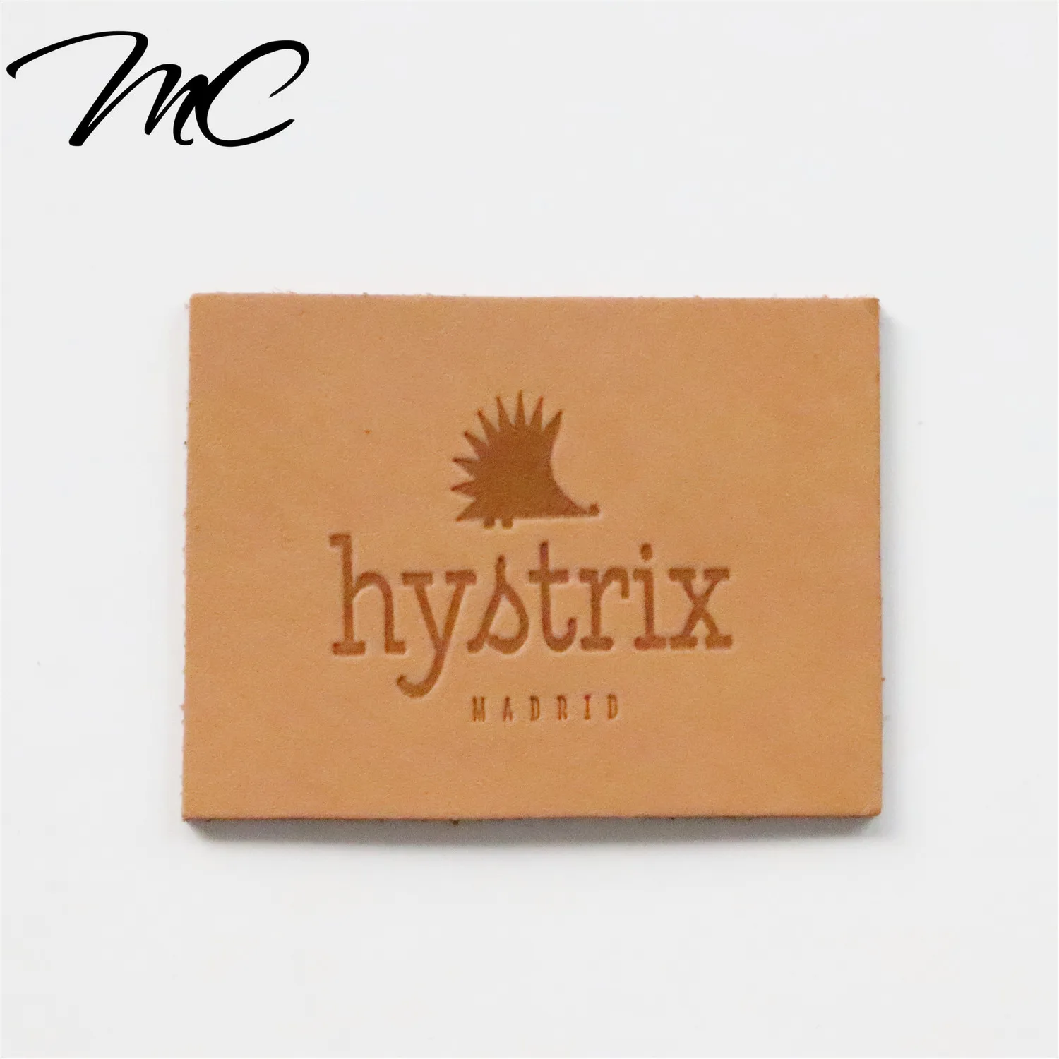 

Fashion Custom Debossed Small Genuine Leather Labels for Clothing