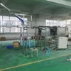 Fully-automatic plastic bottle handle inserting machine