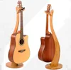 creative musical instrument stand for bass guitar solid bamboo violin stand with ukulele small four string guitar