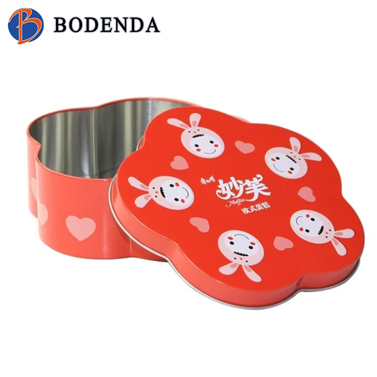 Flower shape tin box that holds cookies and candy