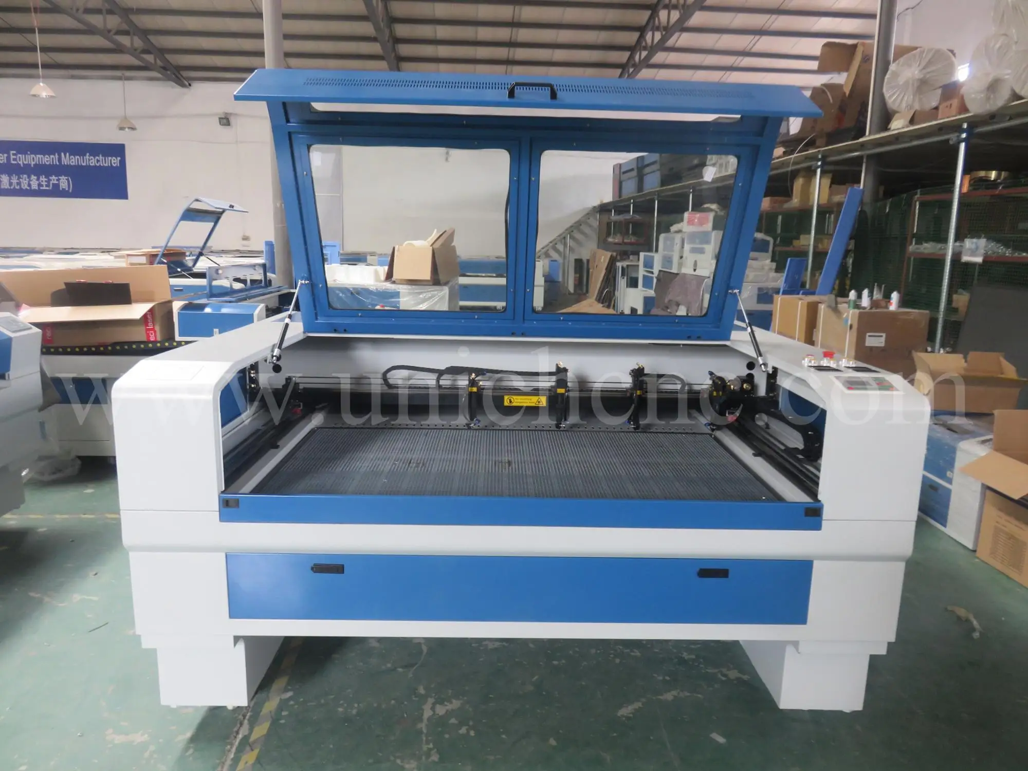 2016 UNICHCNC high precision cnc engraver cutter/four laser heads/fabric laser cutting machine