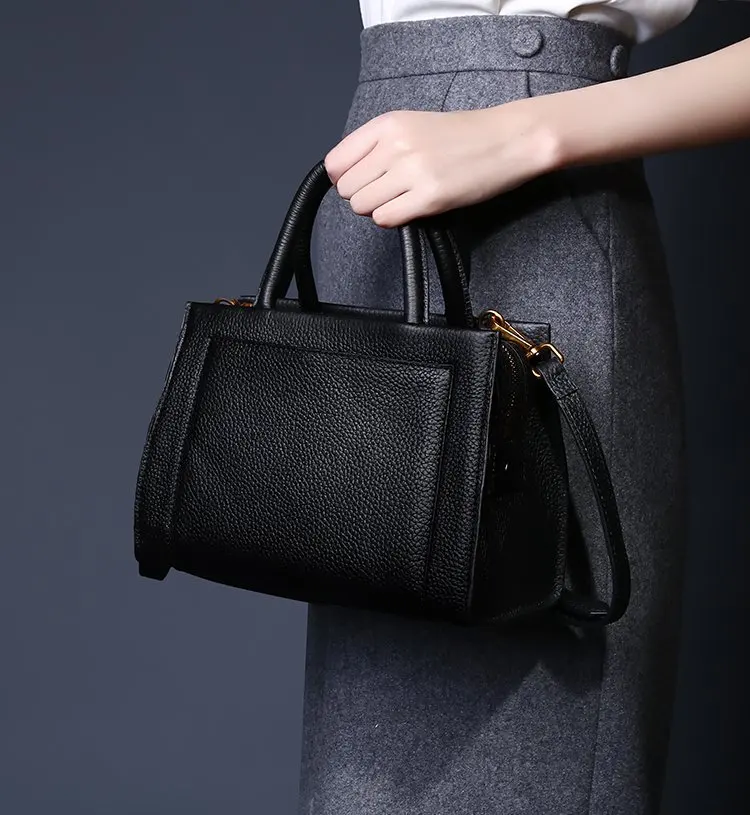 black shoulder strap handbag