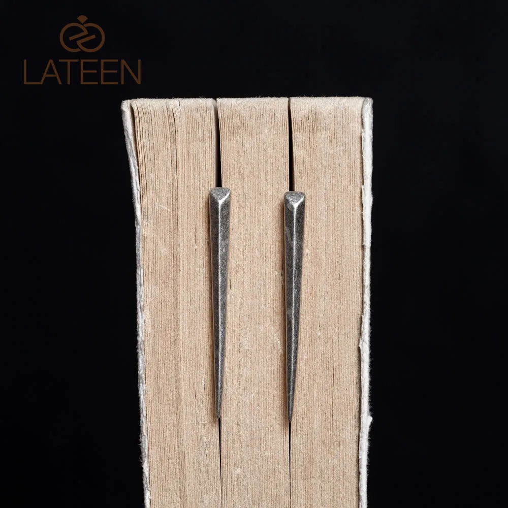 

OEM spiky geometry original silver stud knife exaggerated earrings