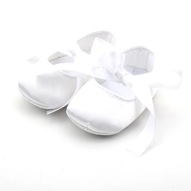 white satin ballet shoes with ribbon