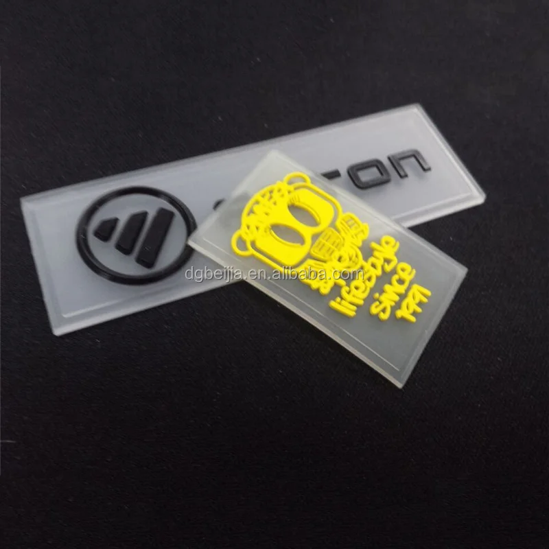 

transparent soft pvc label tag for clothing with custom raised logo