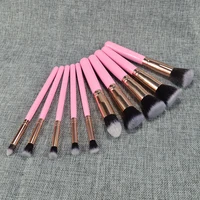 

Profesional custom logo 10pcs kabuki makeup brush kit cosmetic brush set, pink brochas de maquillaje