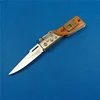 /product-detail/high-quality-oem-wood-handle-gun-shape-knife-whit-led-light-60284080607.html