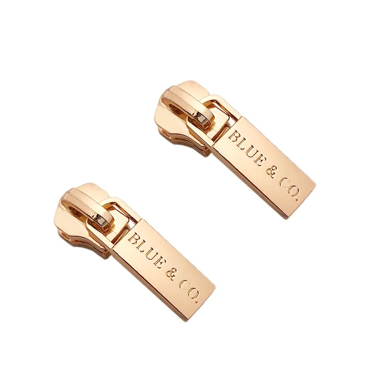 

Zinc alloy embossed rose gold brand logo custom designer metal zip puller with slider for bag