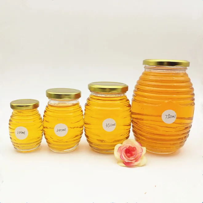 100ml200ml350ml750ml custom honeycomb shape clear empty glass honey jars with lids beehive glass honey jar