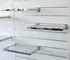 slatwall faucet shelving display systems white wall glass racks panels