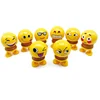 hot sale car decoration smiling face head shaking doll