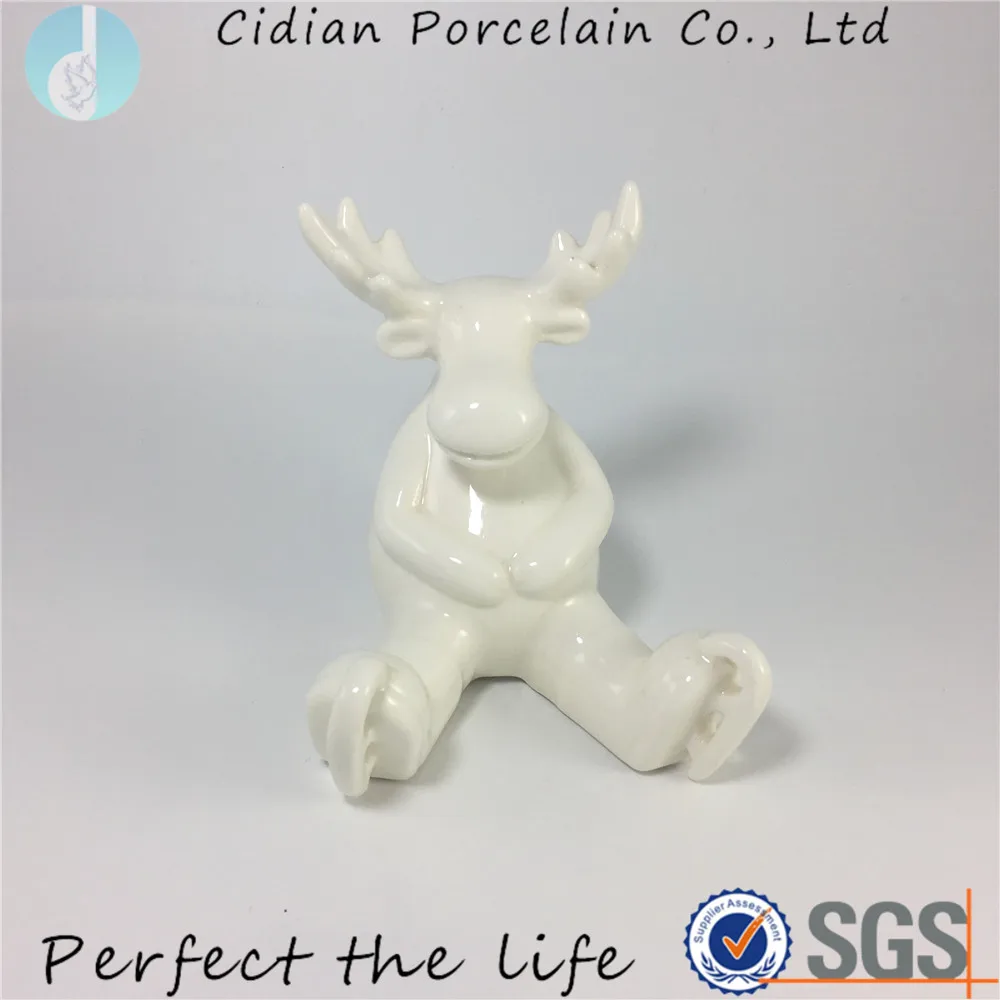 white ceramic reindeer figurine