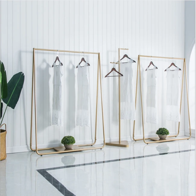 
Gloden European style rack elegant design clothing display rack floor standing fixture for dresses shops rack solutions for shop 