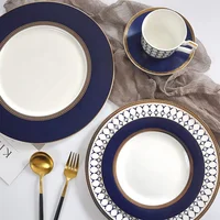 

China gold rimmed navy blue charger plate