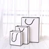 Customized Fashion Print LOGO Size Gift Shopping Kraft White Paper Bag For Packaging Clothes