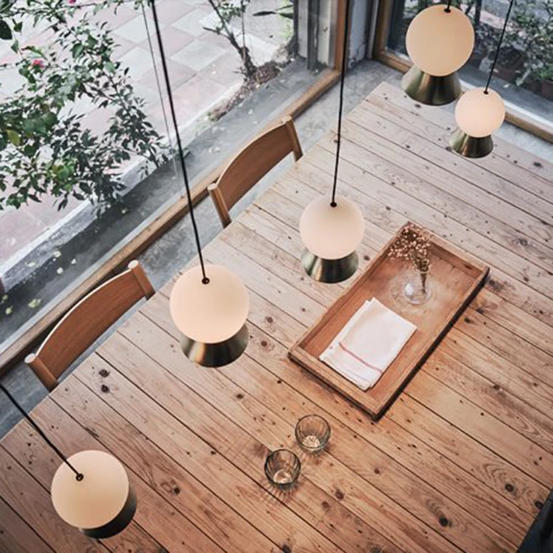 Nordic modern minimalist glass spherical bed line fish line lamps Fuji stairs porch three-head restaurant chandelier
