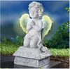 EUROPEAN CREATIVE VILLAGE OUTSIDE GARDEN DECORATION MATTE WHITE RESIN ANGELS HOLDING STAR WITH SOLAR LIGHTED LED WINGS