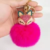 Yongze fluffy pom poms cute rabbit fur animals custom plush keychain Fox head fox puff keychain