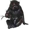Bronze monkey with a peach in hand garden statues foundry