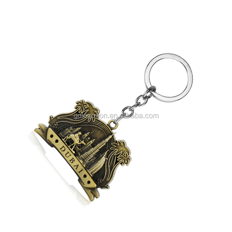 Universal Studios Gold Tone Spinning Keychain