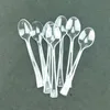 The disposable plastic transparent small spoon used for seasoning