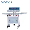 The vertical Continuous Aluminum Foil Induction Sealer/ Induction sealing machine