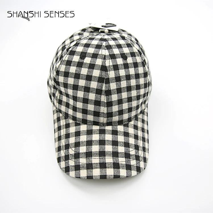 black and white checkered baseball cap