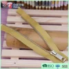 Metal light gold zipper with gold-wire tape