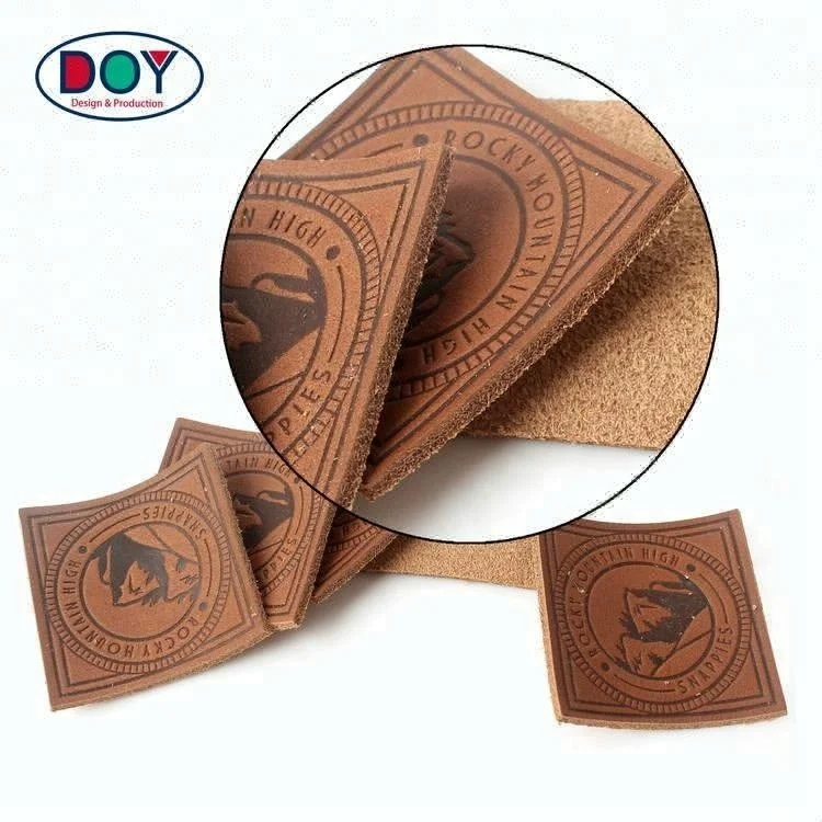 
High Quality Hot Stamping Custom Logo Embossed Real Leather Labels Patches for Jeans and Bags 